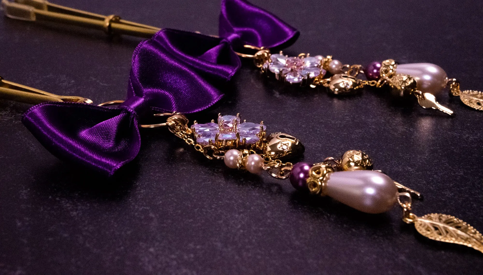 Deluxe Imperial Purple Bow Tweezer Nipple Clamps in Gold